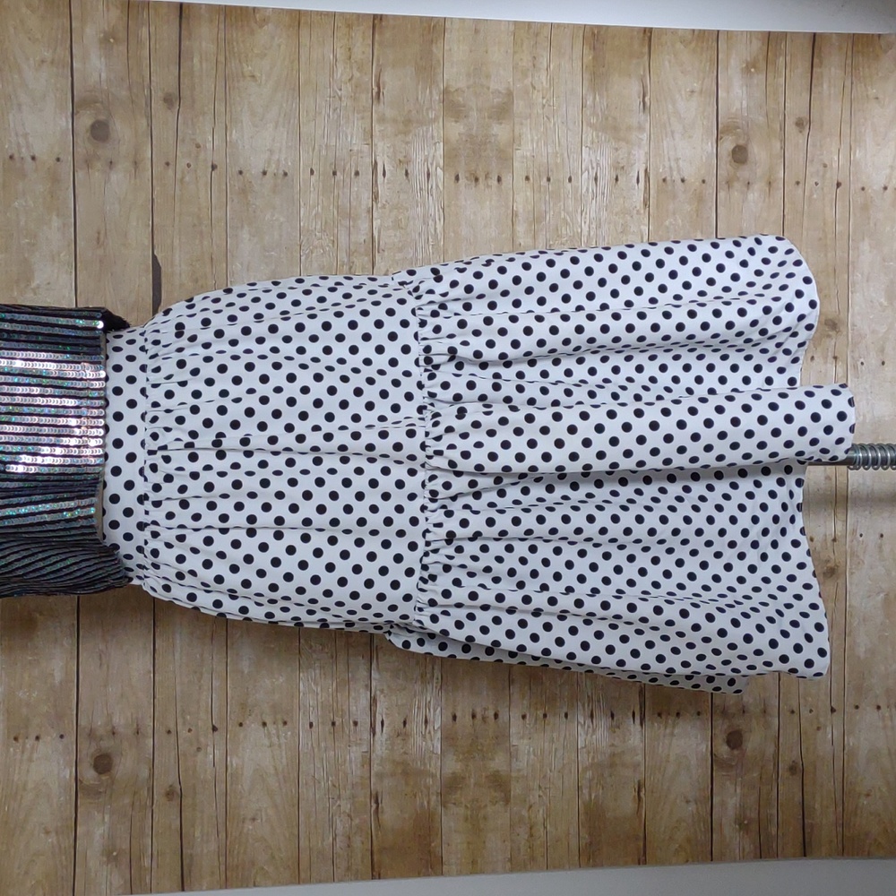 Black and white polka dot tea-length ruffle skirt